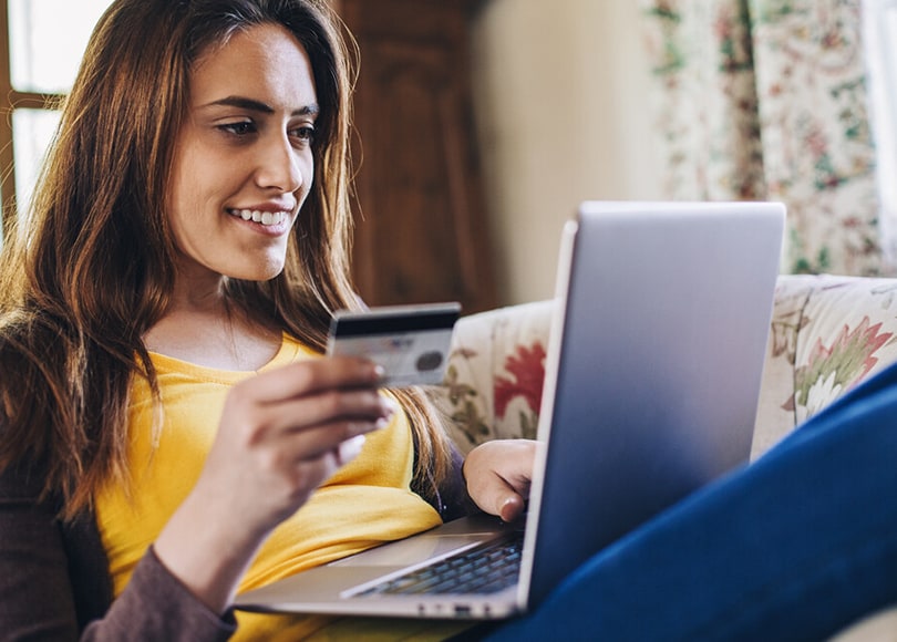 female-shopping-online-home-810x580